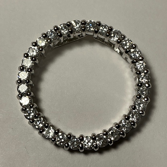 Sterling Silver Round Open Pendant with clear stones. 1 1/8 inch diameter - Picture 1 of 7